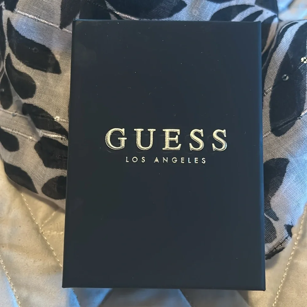 Guess cross silver plated necklace